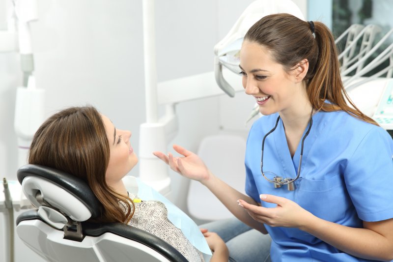 patient visiting dentist for tooth-colored filling